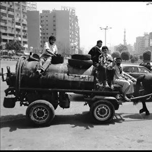 Horse drawn vehicle in Cairo traffic, Egypt. Date: 1980s