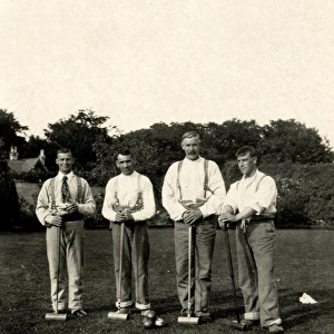 Four hospital patients ready for croquet