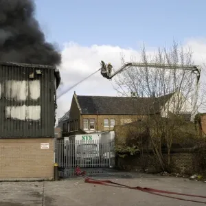 A hydraulic lift in action at scene of fire, Penge A hydraulic lift in action at scene of fire, Penge