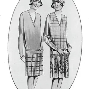 Illustration of two dresses made using the same dress pattern. Date: 1920s Illustration of two dresses made using the same dress pattern. Date: 1920s