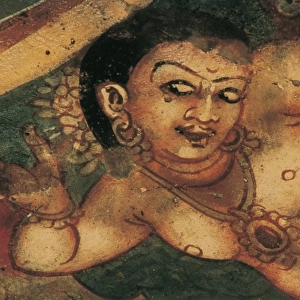 INDIA. Ajanta. Ajanta Caves. Detail with a feminine