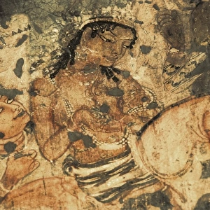 INDIA. Ajanta. Ajanta Caves. Detail with a feminine
