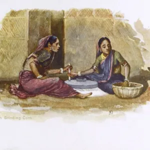 India - Ghati Women Grinding Corn