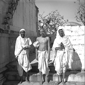 Three Indian men in white robes