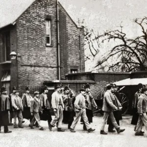 Inmates of Belmont Workhouse, Sutton, on their way to prison