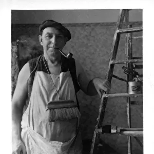 Interior Decorator with his brushes, ladder and pipe