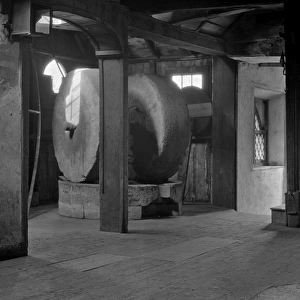 Interior of a mill with two millstones