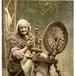 Irish spinner and spinning wheel. County Galway, Ireland