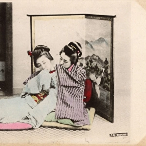 Japan - Two Geisha Girls whispering to each other