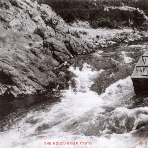 Japan - Poling a barge along the Hozu River