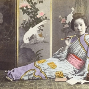 Japan - Reclining Geisha girl smoking