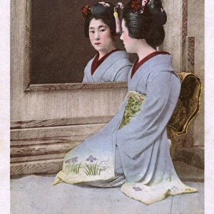 Japanese Geisha admiring her reflection - entitled Vanity