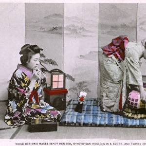 Japanese Woman O-Koto-San has a smoke before bed