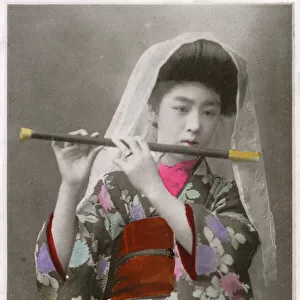 Japanese woman playing a flute