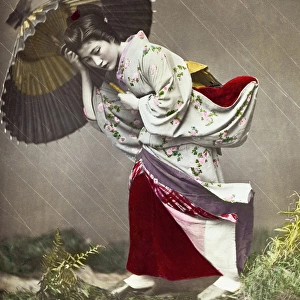 Japanese woman in a rainstorm