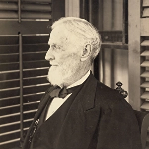 Jefferson Davis, seated, facing left, during portrait sessio