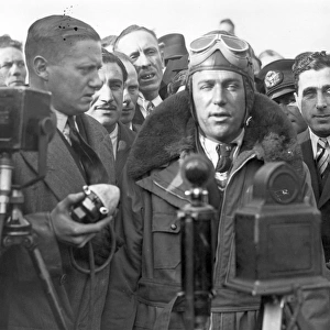 Jim Mollison talking to the press at Croydon Aerodrome