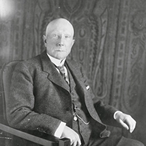 John D. Rockefeller, three-quarter length portrait, seated