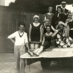 Jolly Seaside Theatrical Troupe pose on a flatbed truck