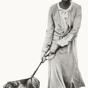 Josephine Baker with her pet cheetah