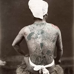 Jpan, man with extensive ornate tattoo, tattooing
