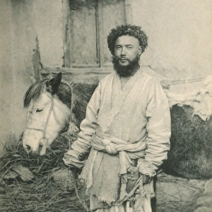 Kashmir, India - A Uighur Man and Mule