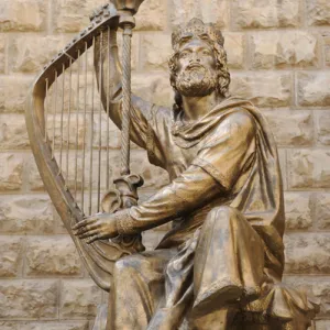 King David of Israel (C. 1040-970 BC) playing the harp. Stat