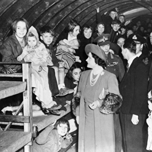 King and Queen visiting children in Underground shelters