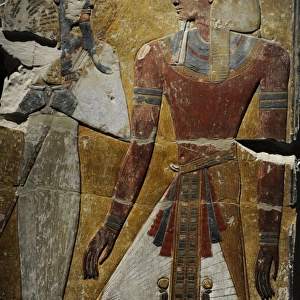 King Seti I in front of the God Osiris. Fragment of a pillar