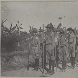 Kingston scouts on a road, Jamaica