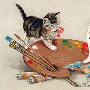 Two kittens on an artists palette on a greetings postcard