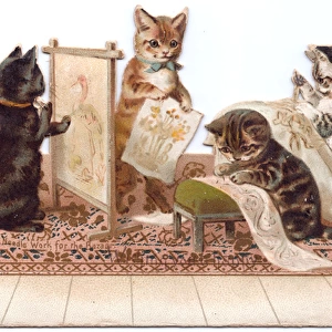 Four kittens on a cutout greetings card