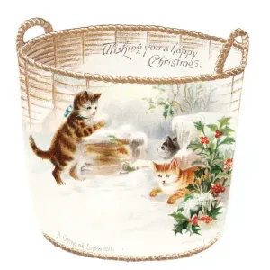 Three kittens snowballing on a cutout Christmas card Three kittens snowballing on a cutout Christmas card