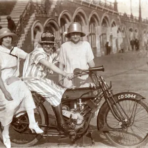 Three ladies on a 1908 Phelon & Moore motorcycle