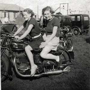 Ladies on a 1930s Sunbeam motorcycle