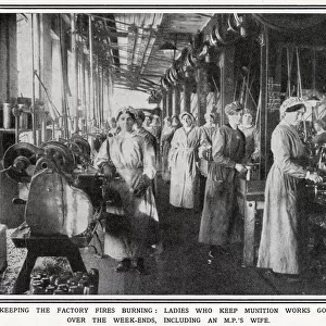 Ladies at a factory in Scotland keep munition works going at the weekend