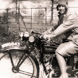 Two ladies on New Imperial motorcycle