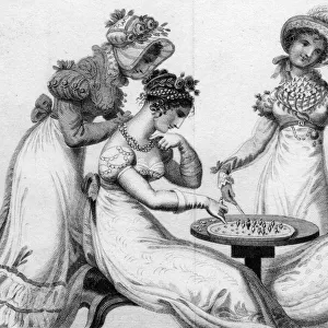 LADIES PLAYING SOLITAIRE