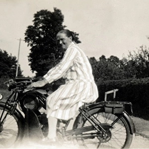 Lady on 1926 Royal Enfield motorcycle