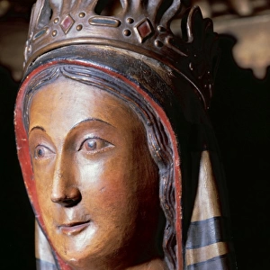 Our Lady of Good Help. Polychrome woodcarving. 13th century