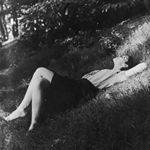 LADY RELAXING 1940S