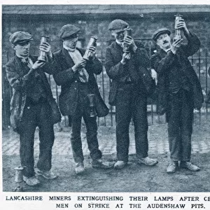 Lancashire miners extinguishing their lamps after ceasing work