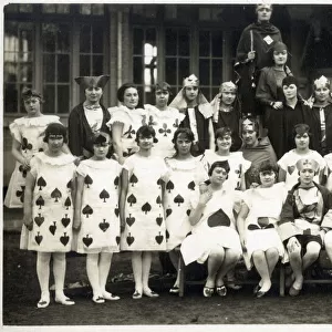 Large group of French Schoolgirls dressed as a deck of cards