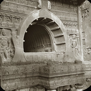 A large round doorway carved from stone