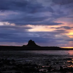 Lindisfarne Castle, Holy Island, at dawn as the sun rises