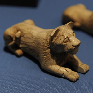 Lion-shaped piece of game. Ivory. From a tomb in Abydos. Ear