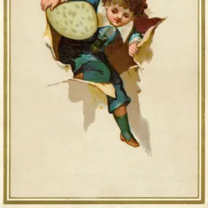 Little boy with an Easter egg bursting through paper