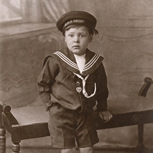 Little boy in HMS Orion cap and uniform, WW1