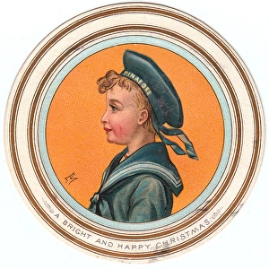 Little boy in sailor suit on a circular Christmas card