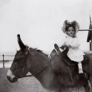 Little girl on a donkey, Saltburn, North Yorkshire